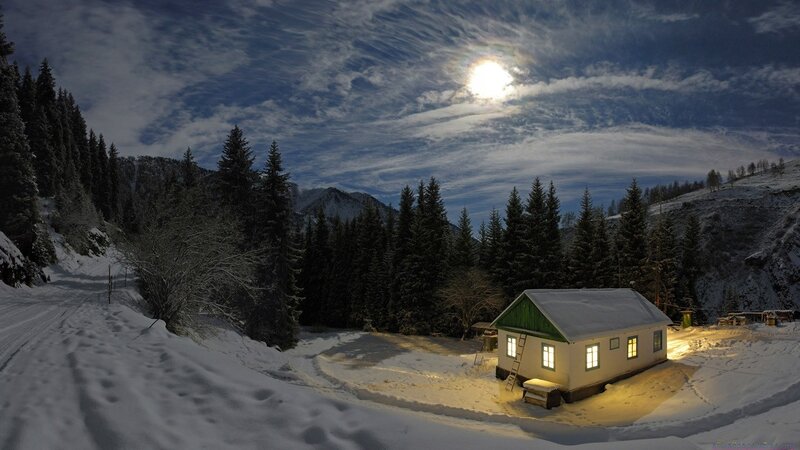 Cabin in snowy mountains