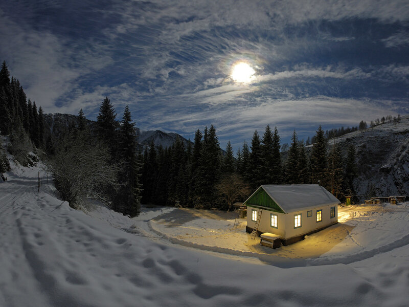 Cabin in snowy mountains