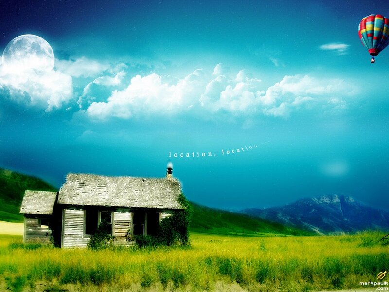 Cabin in the field with hot air balloon