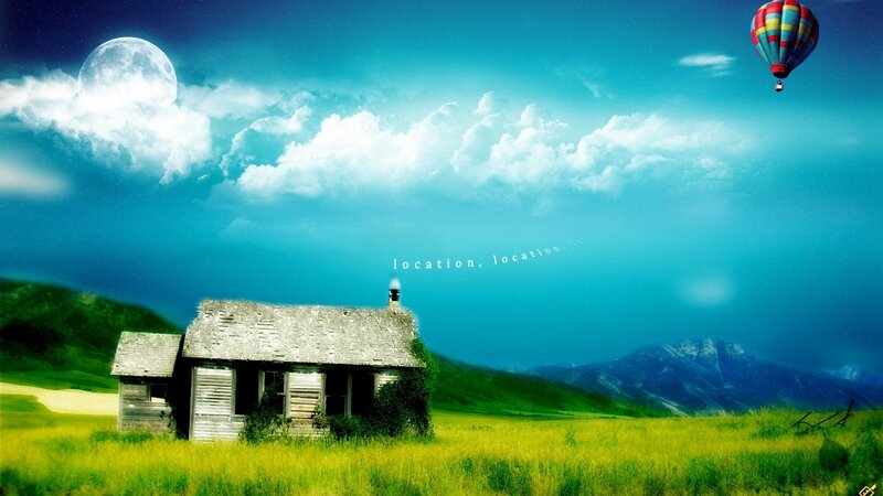 Cabin in the field with hot air balloon