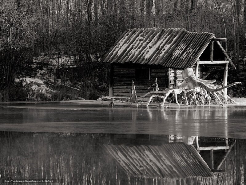 Cabin on a frozen lake