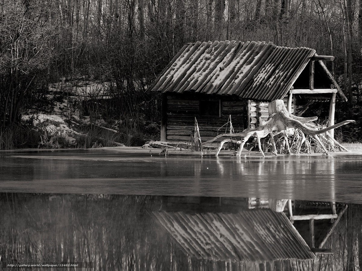 Cabin on a frozen lake
