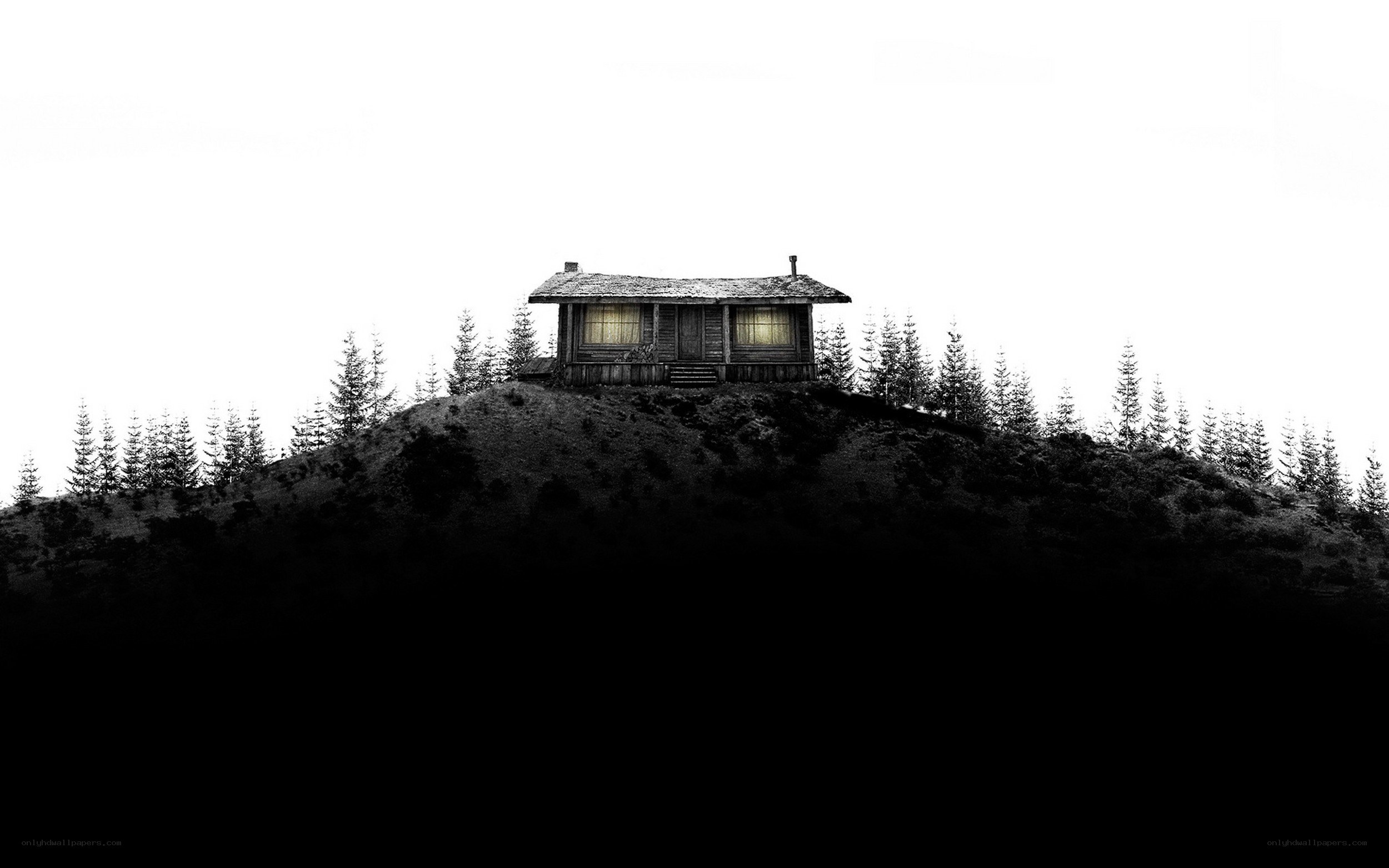 Cabin on a hill at night