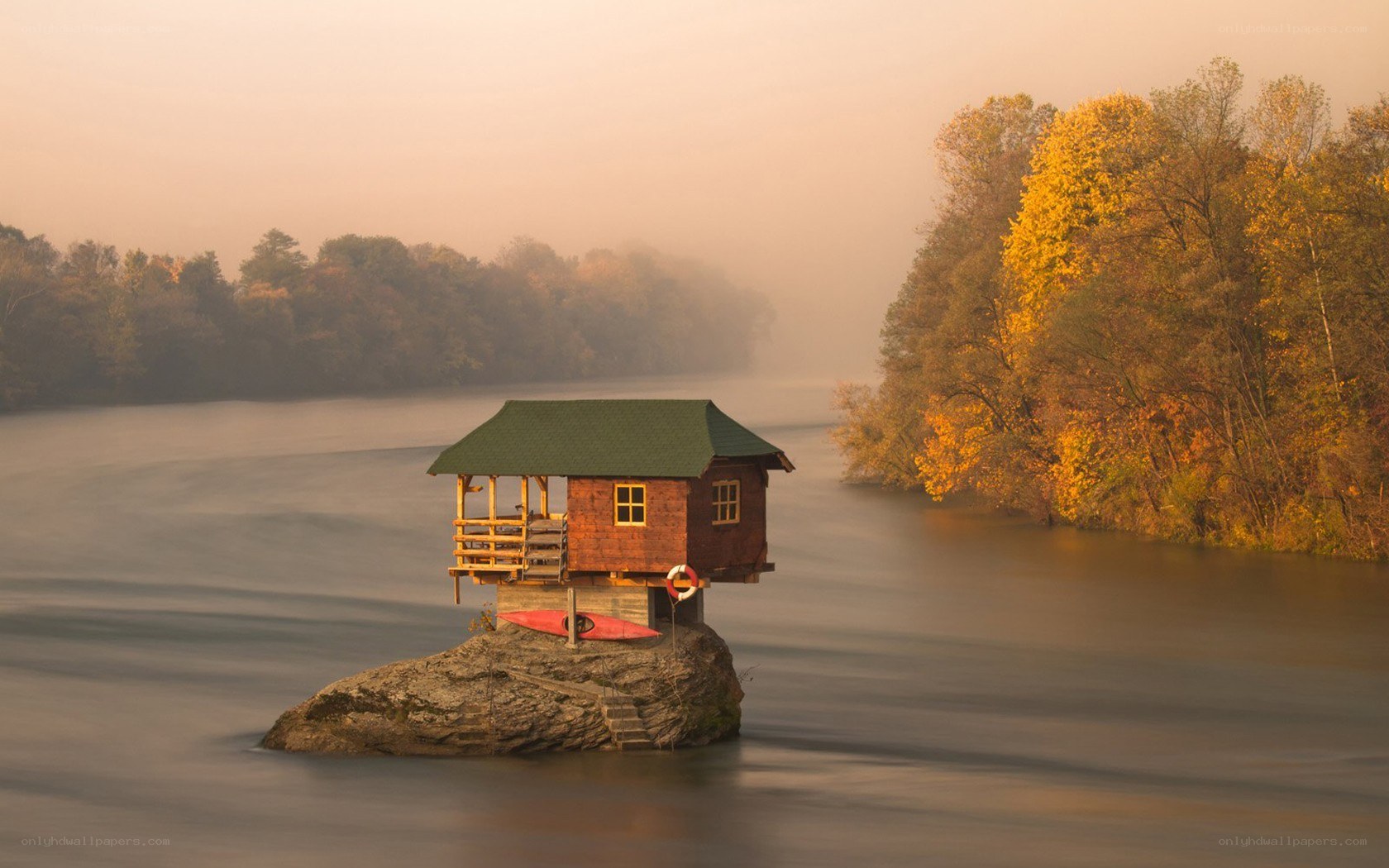 Cabin on a river rock
