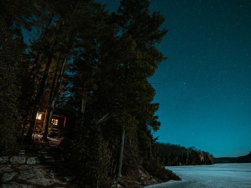 Cabin on Frozen Lake — Blue, Serene, Night