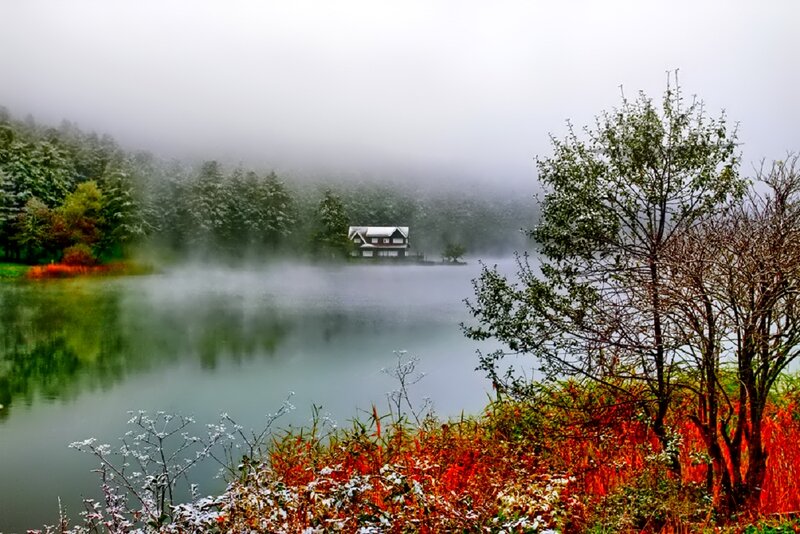 Cabin on Lake in Fog