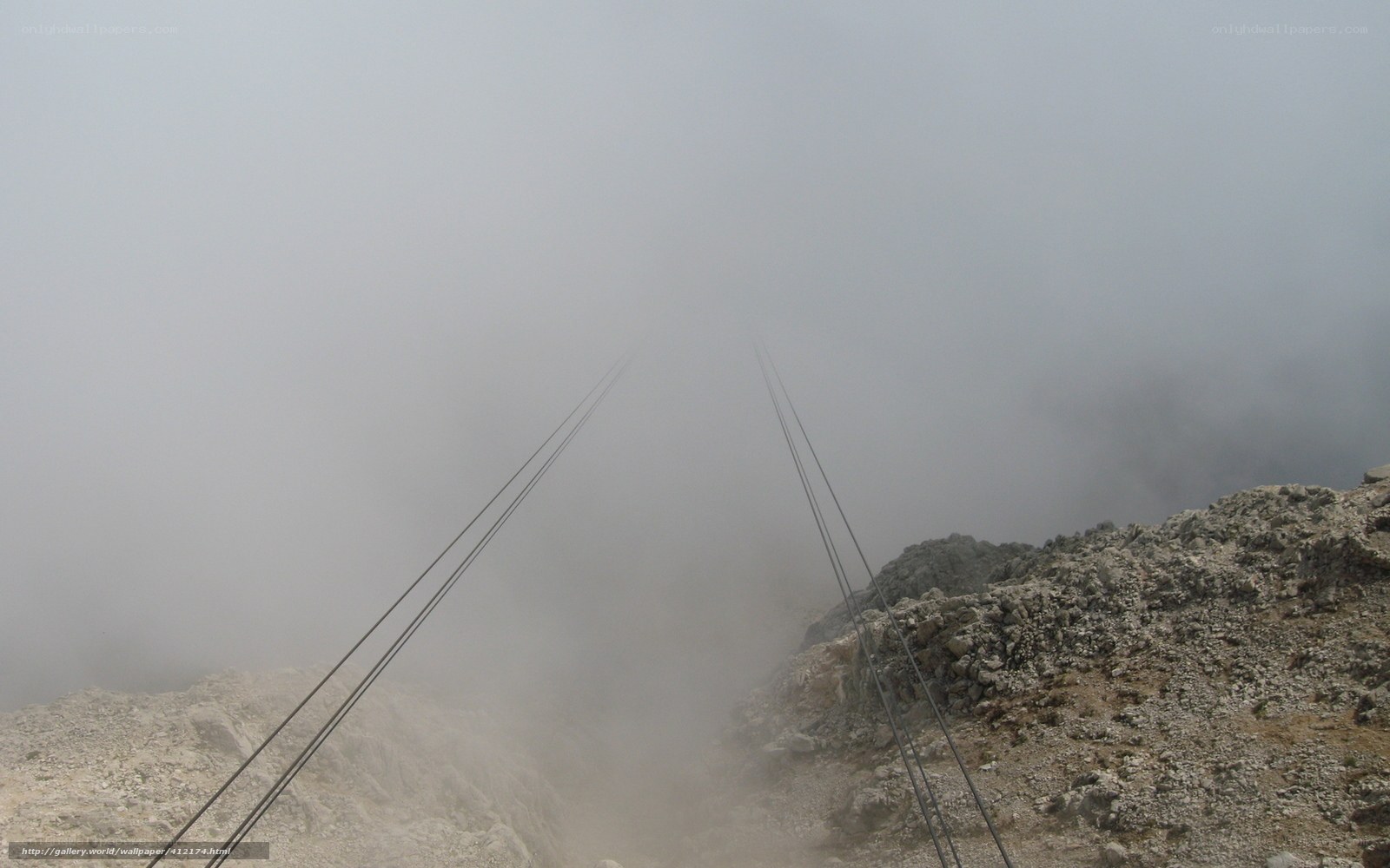 Cable car cables in fog