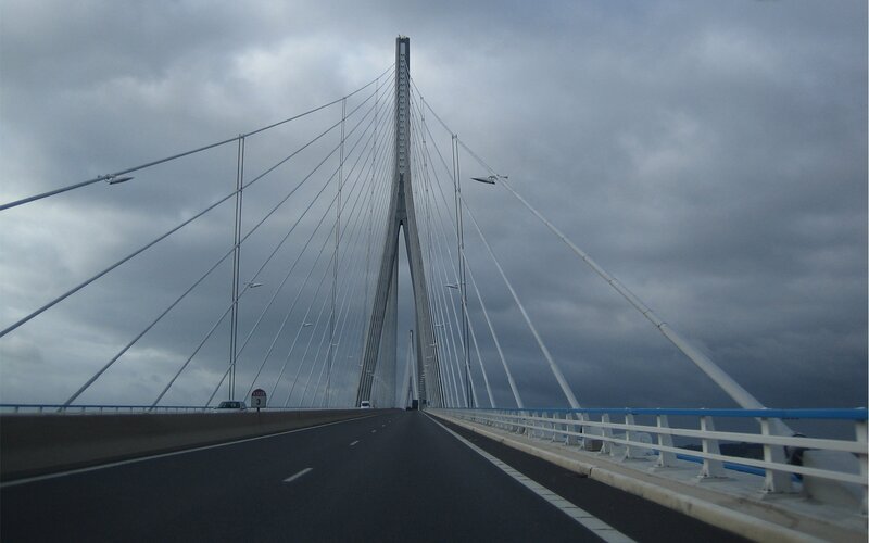 Cable-stayed bridge under cloudy sky