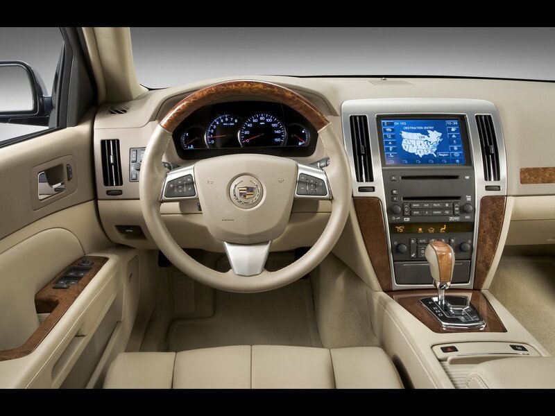 Cadillac Car Interior — Beige, Neutral, Photograph, Steering Wheel, Dashboard, Infotainment Screen