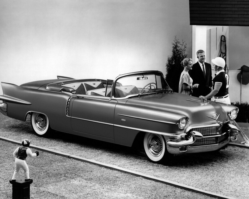 Cadillac convertible with people