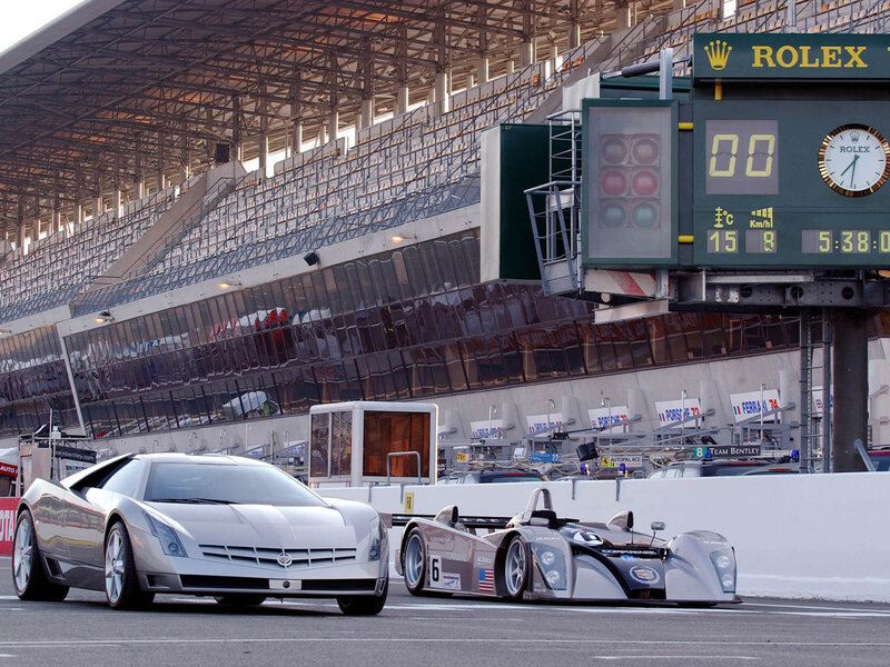Cadillac race cars at a track