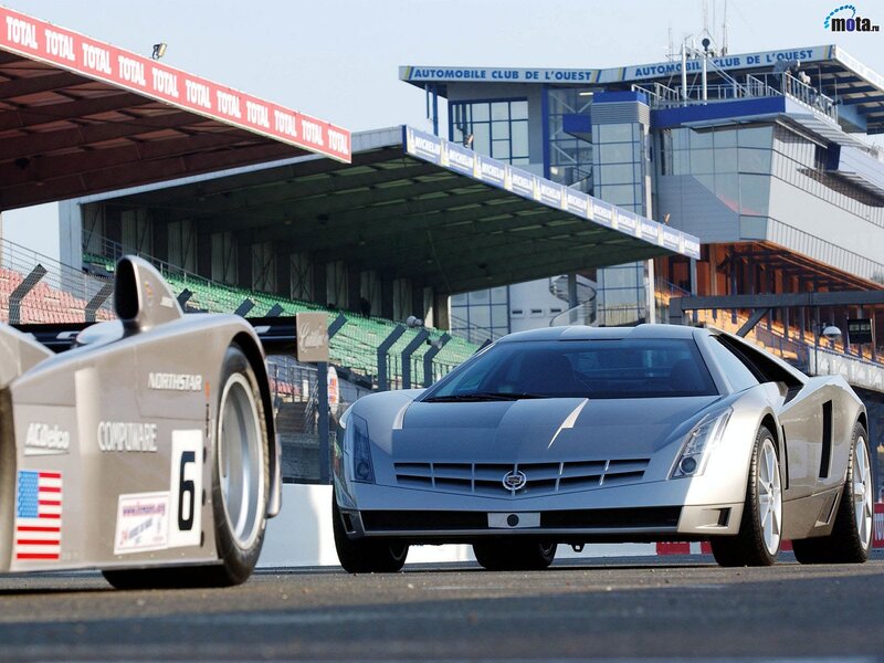 Cadillac race cars at a track