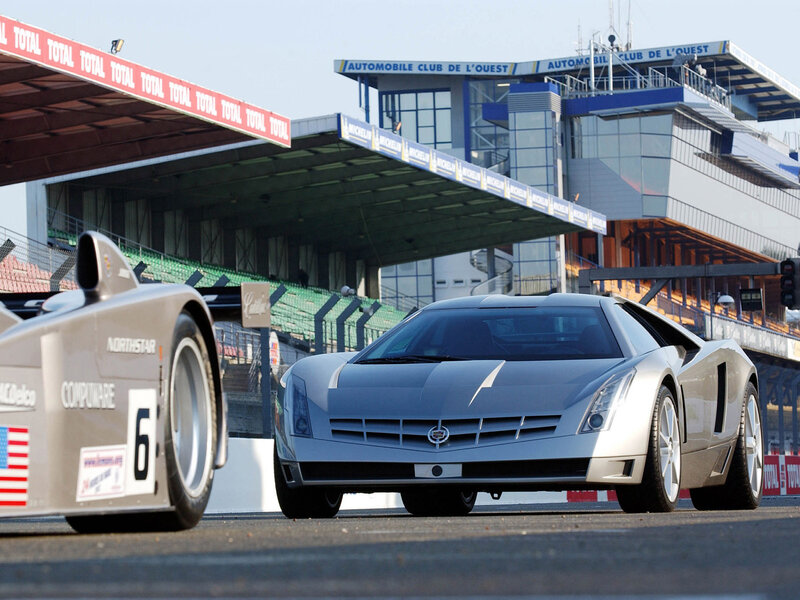 Cadillac race cars on track