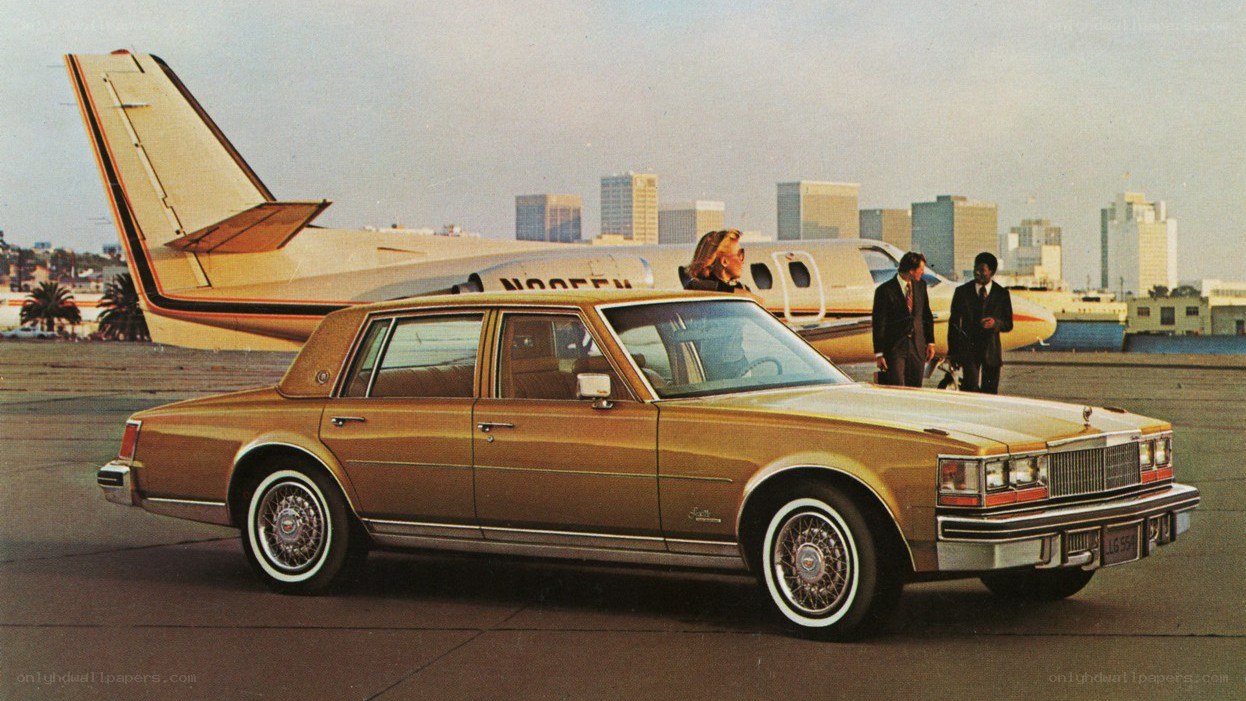 Cadillac sedan with private jet