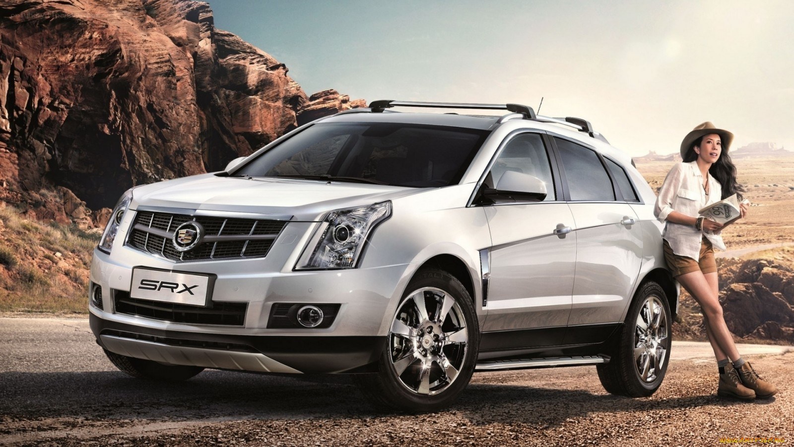 Cadillac SRX in desert landscape