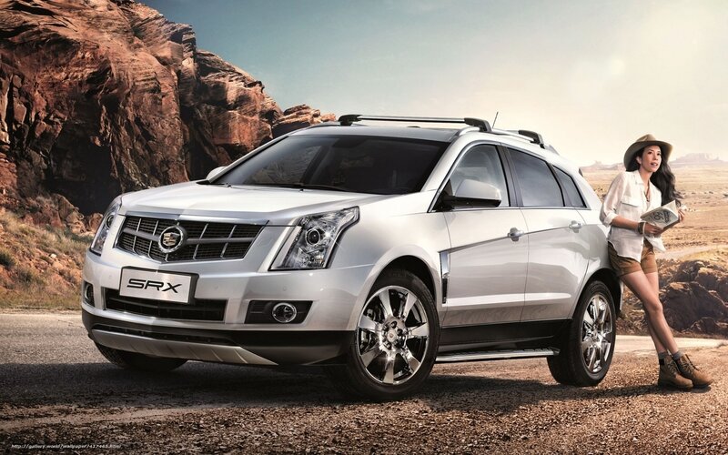 Cadillac SRX in desert landscape