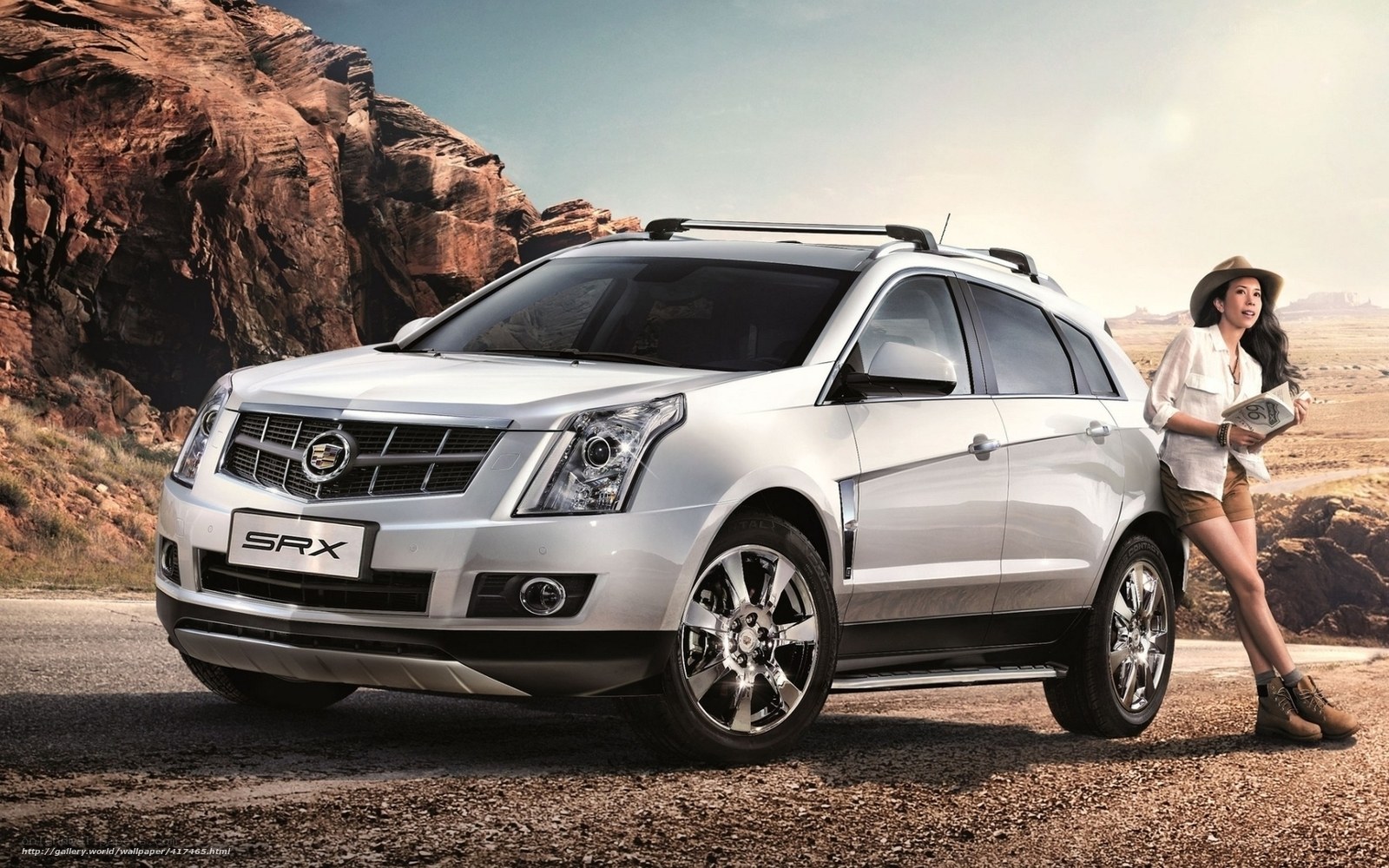 Cadillac SRX in desert landscape