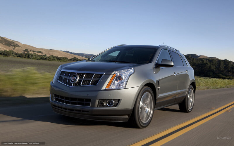 Cadillac SRX on a country road