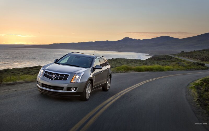 Cadillac SRX on coastal road