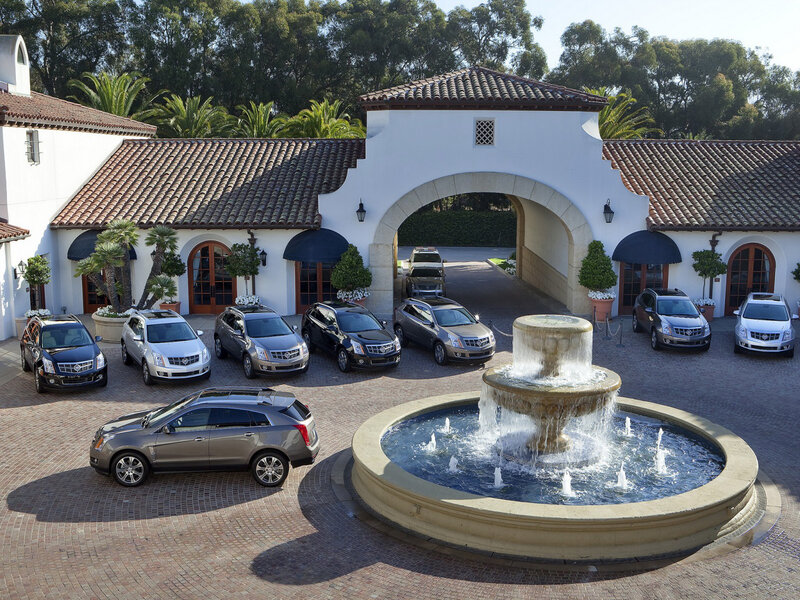 Cadillac SUVs in Courtyard
