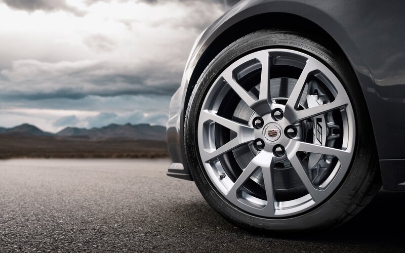 Cadillac wheel on desert road