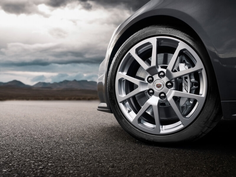 Cadillac wheel on desert road