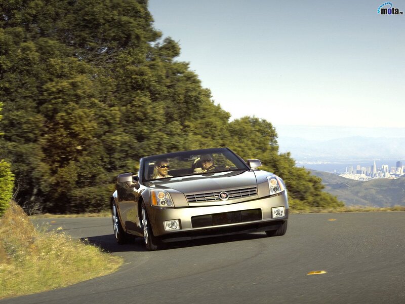 Cadillac XLR convertible on a scenic road