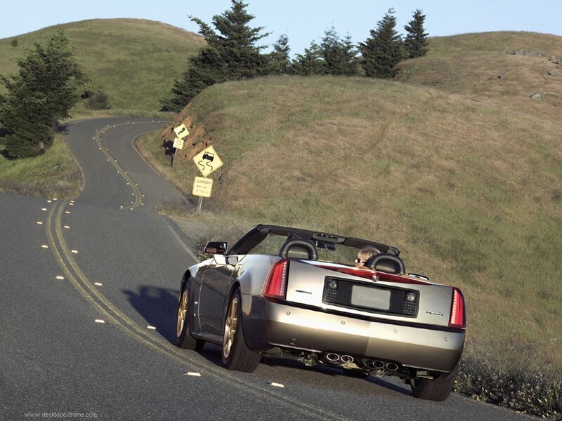 Cadillac XLR convertible on a winding road