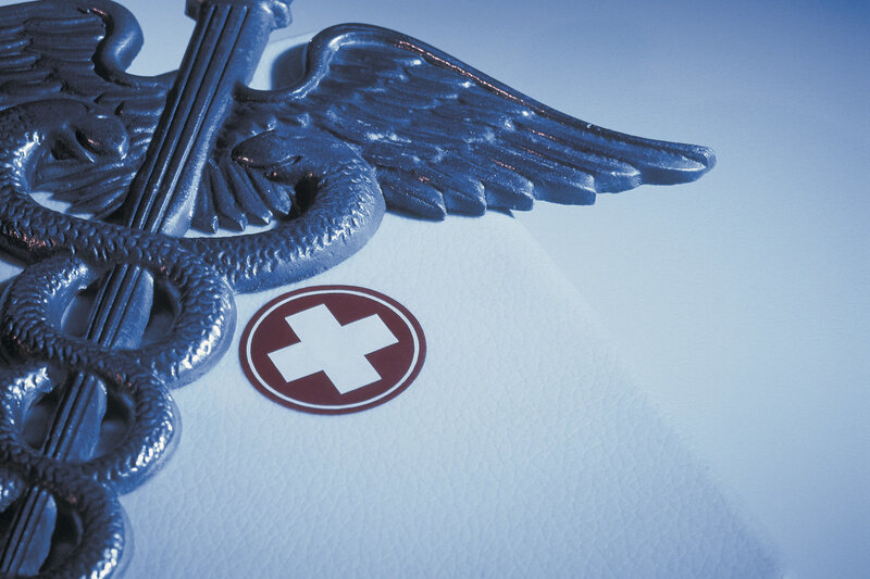 Caduceus symbol with medical cross