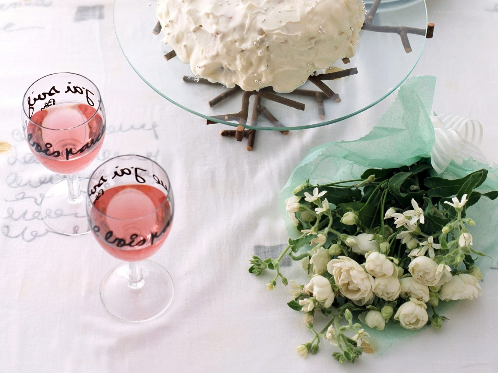 Cake and wine on table
