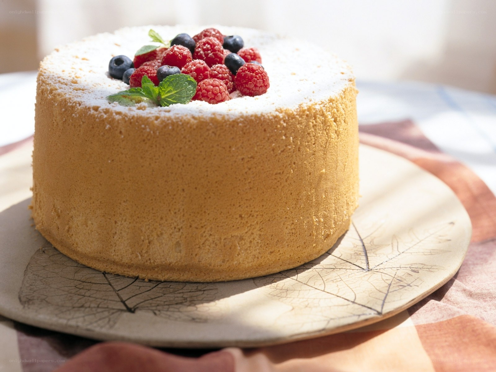 cake with berries and mint