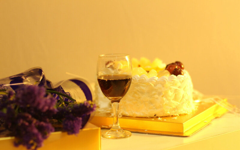 Cake with Wine and Flowers