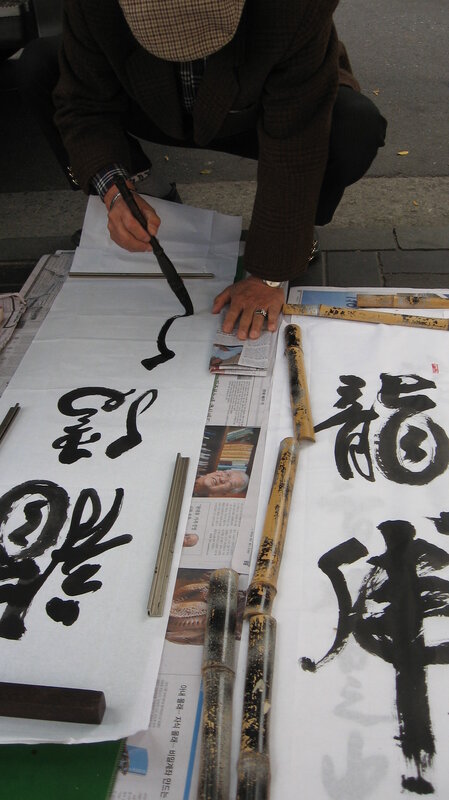 calligraphy artist at work