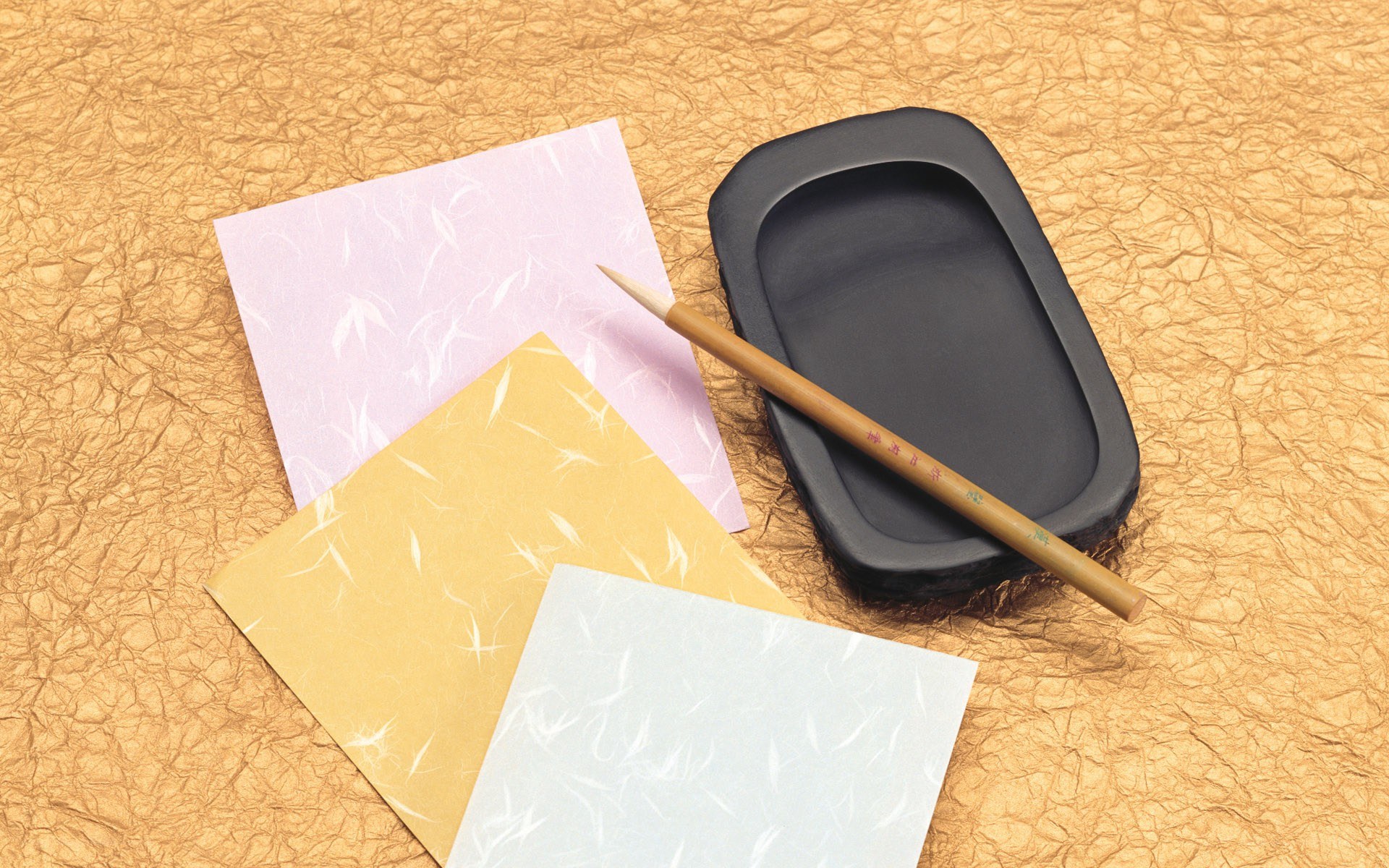 Calligraphy tools on textured paper
