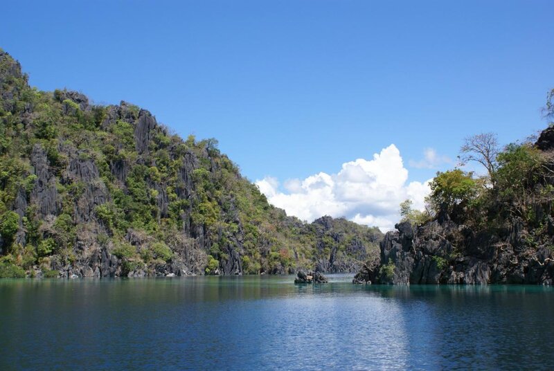 calm bay with rocky cliffs