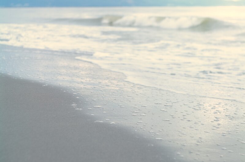calm beach waves at dawn