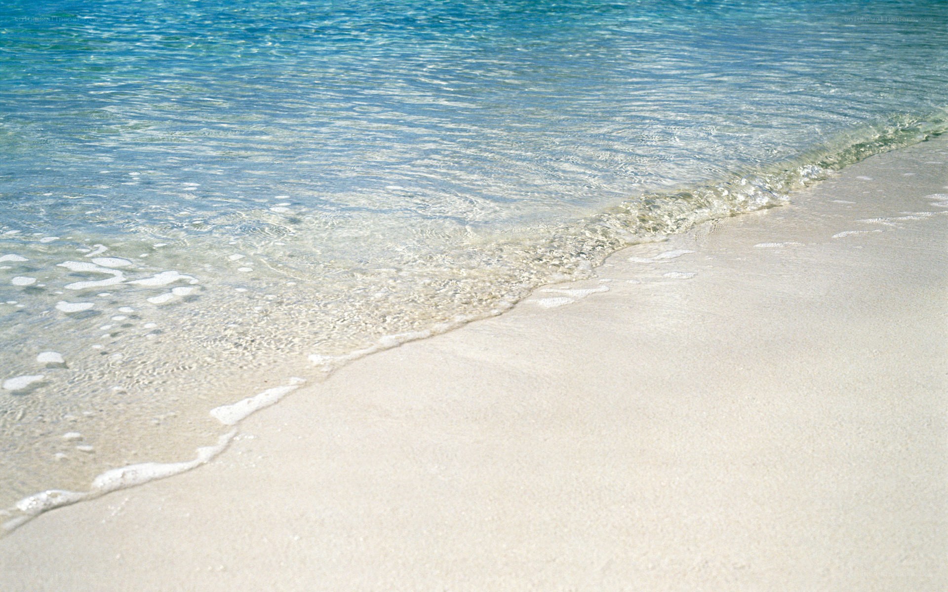 Calm beach with gentle waves