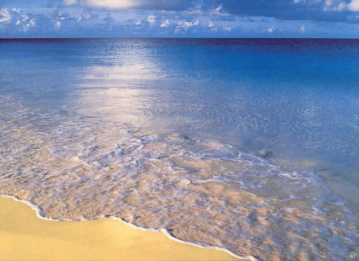 Calm beach with gentle waves