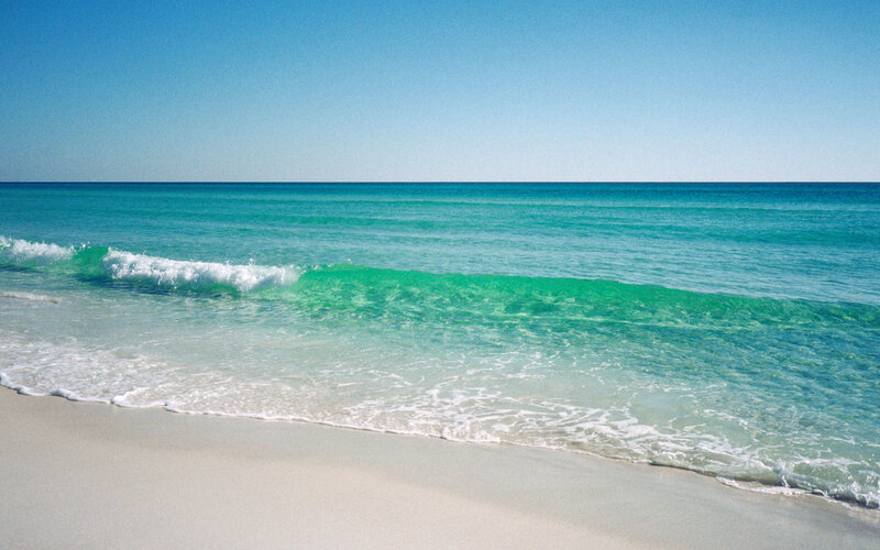 Calm beach with turquoise waves