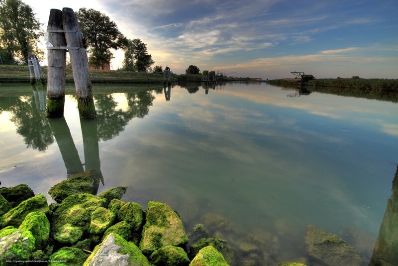 Calm canal at sunset