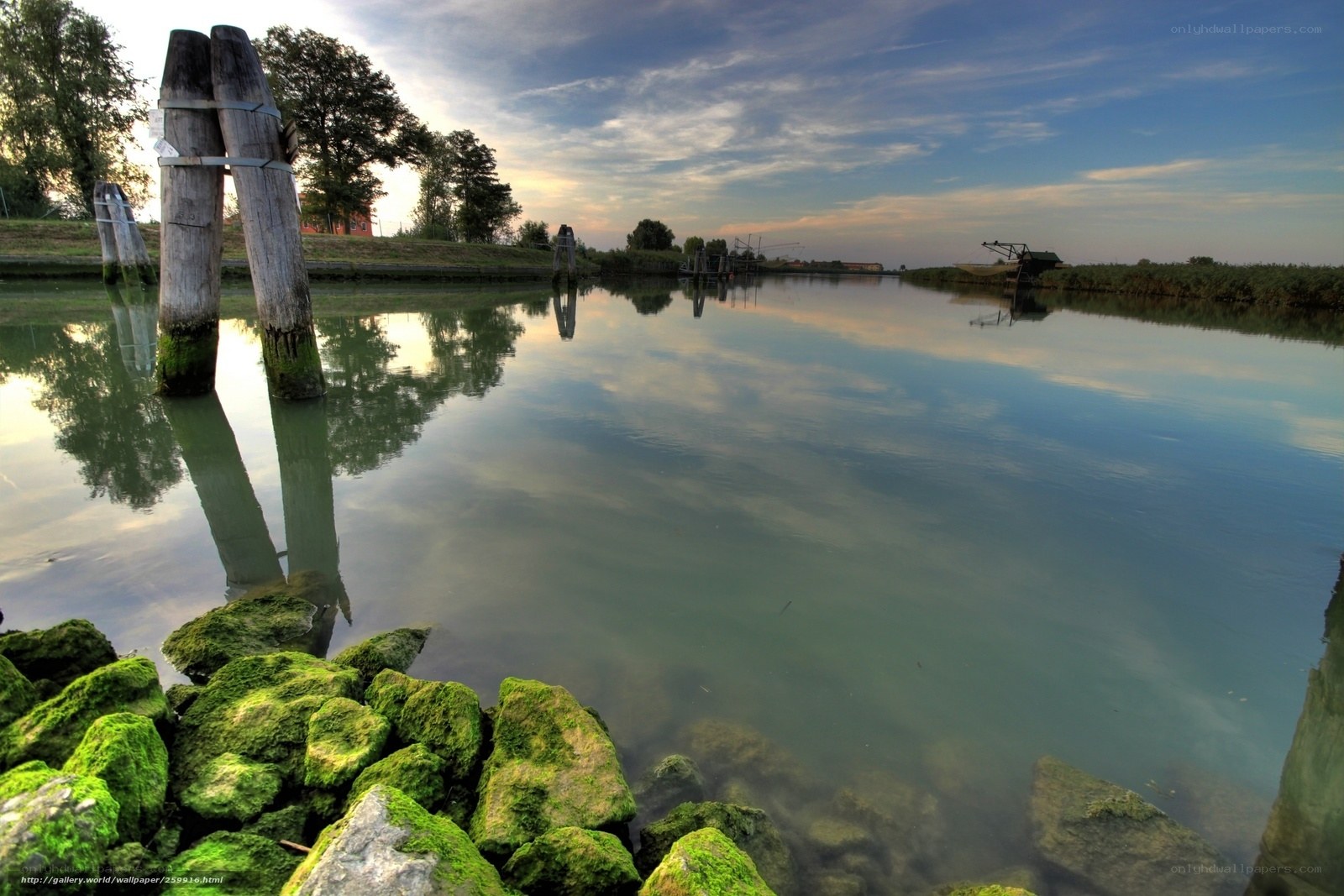 Calm canal at sunset