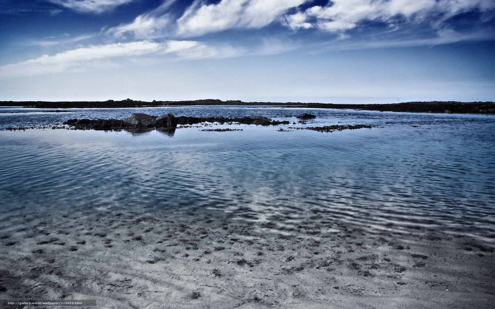 calm coastal waters at low tide