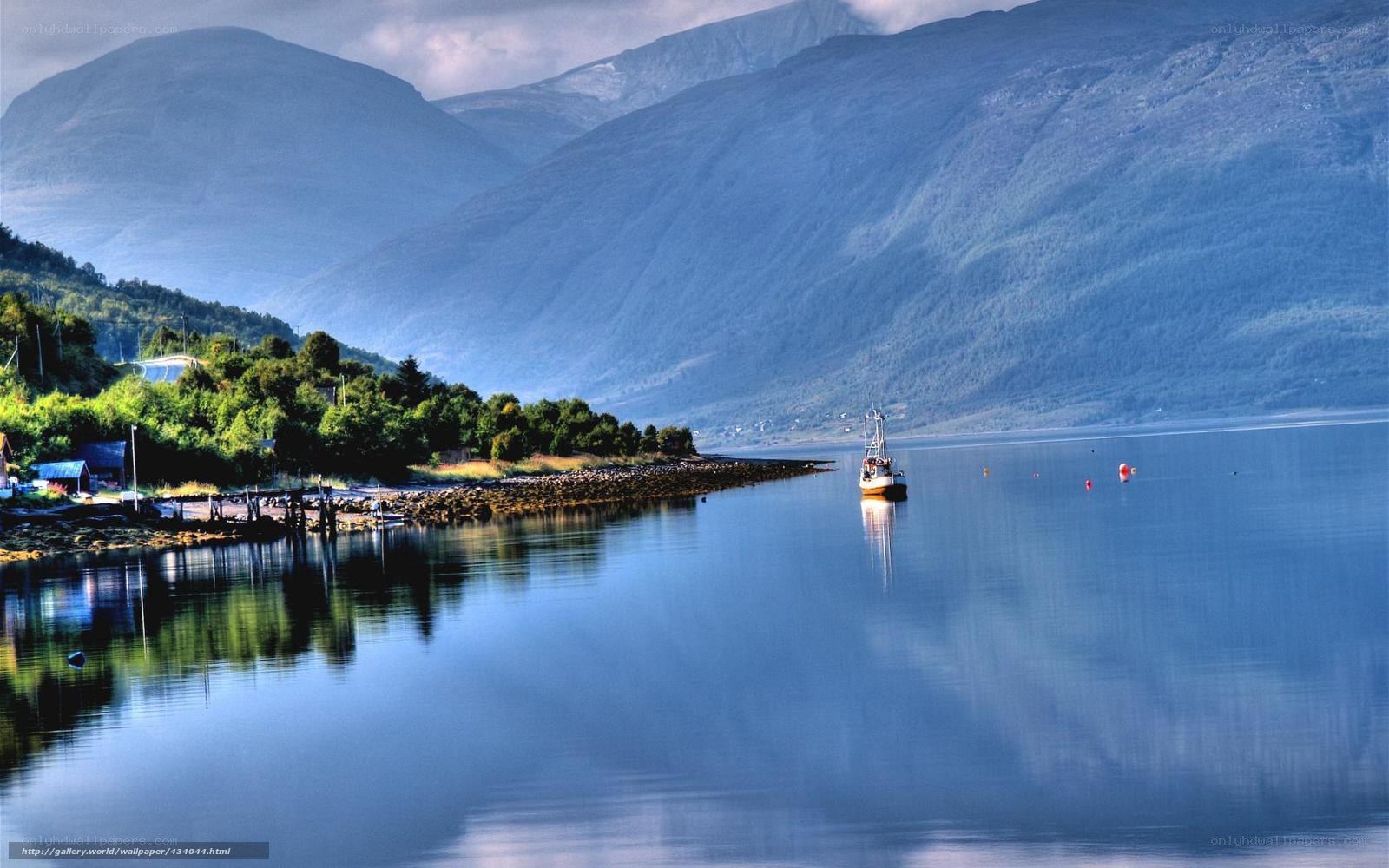 Calm fjord with mountains
