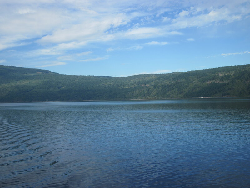 Calm Lake and Forested Hills