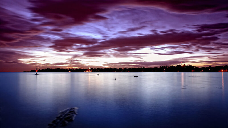 Calm Lake at Dusk — Purple, Serene, Sunset, Photograph, Sky, Clouds, Lights