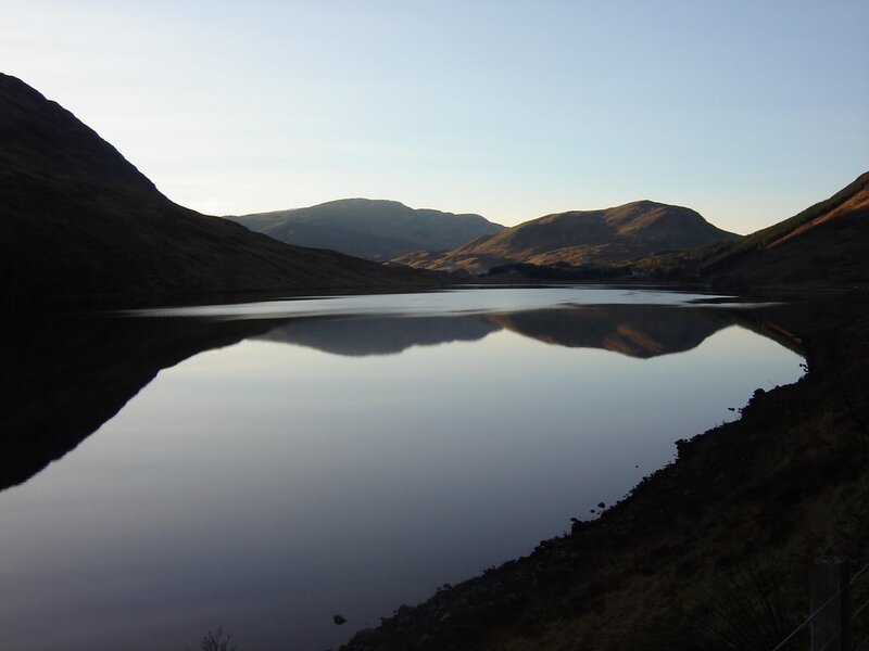 calm lake in mountain valley