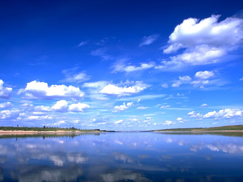 Calm Lake under Blue Sky — Serene