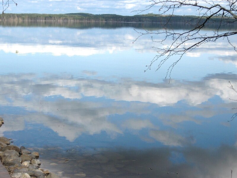 Calm lake with cloud reflection