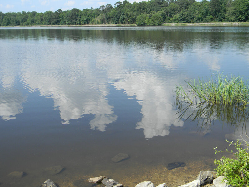 Calm lake with cloud reflections