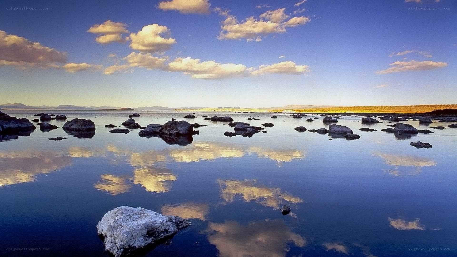 calm lake with cloud reflections